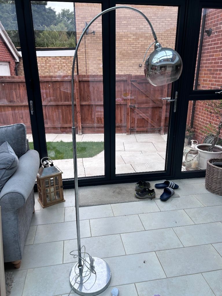 Standing lamp with orb pendant