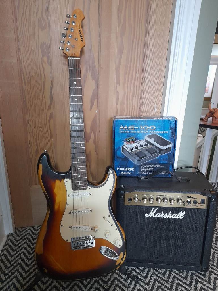 Aria distrested strat.nux mg100.marshall amp.
