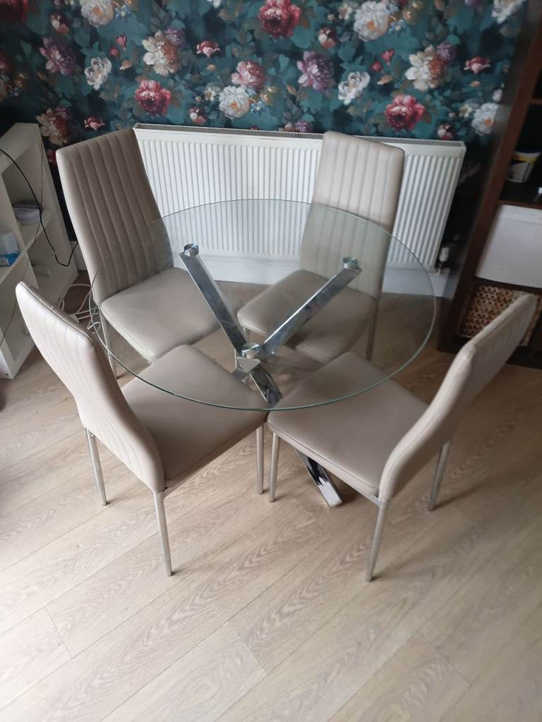 Glass Dining Table with 4 Beige Chairs – Used Condition
