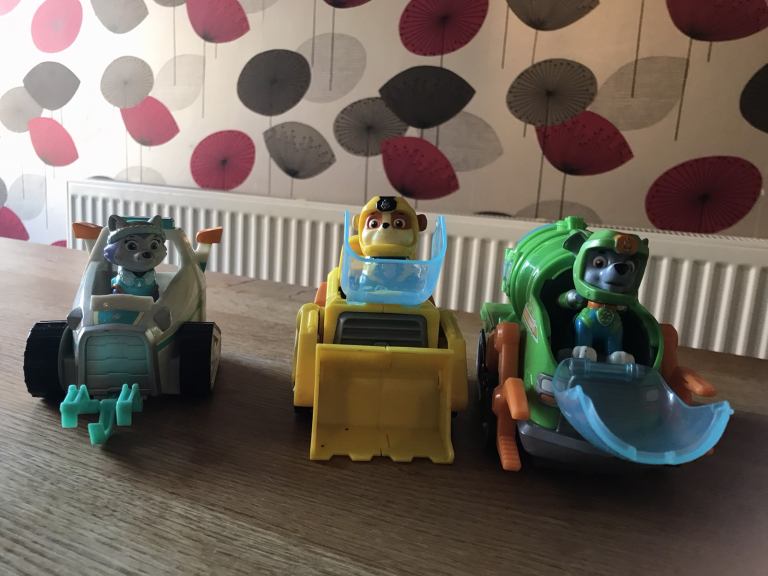Selection of 3 paw patrol vehicles and pups