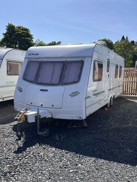 Good condition 4-berth touring caravan with fixed island bed
