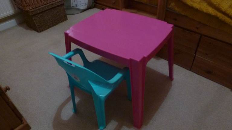 Pink table with a blue chair, perfect for kids. Children's Plastic Table and Chair 
