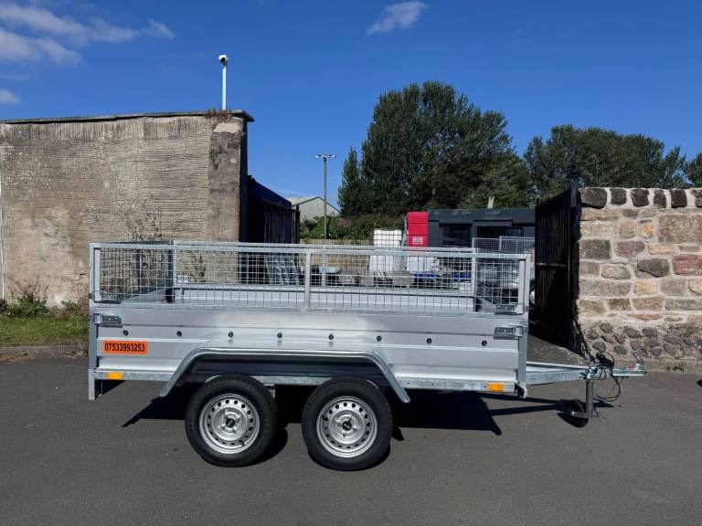 BRAND NEW 8,7FT X 4,2FT TWIN AXLE TRAILER WITH 40CM MESH 750KG