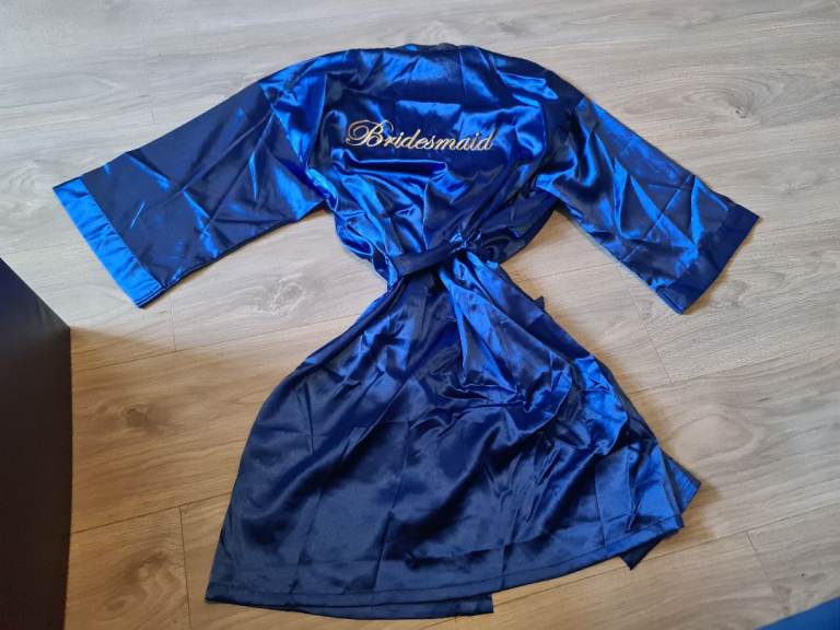 Blue satin styled bridesmaid robe with gold 'Bridesmaid' embroidery #wedding #bridesmaid #royalblue