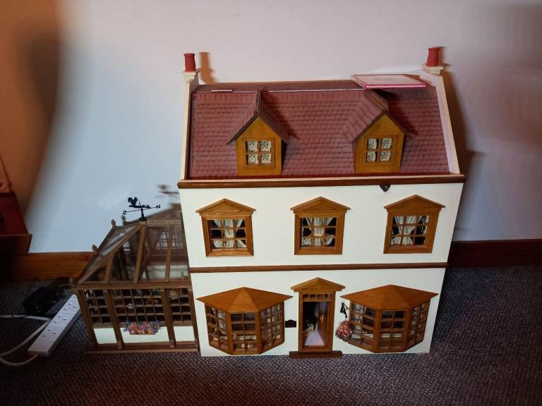 Adult dolls house with conservatory 