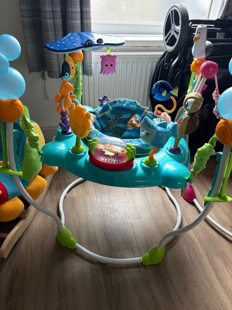 Baby Activity Jumper with Toys – Good Condition