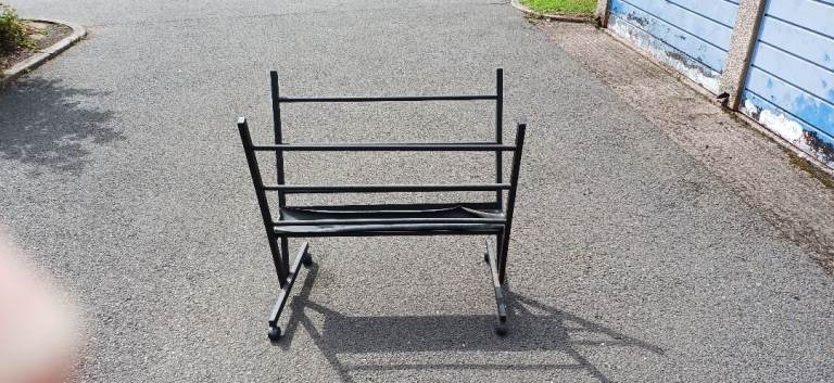 Large metal print rack on casters