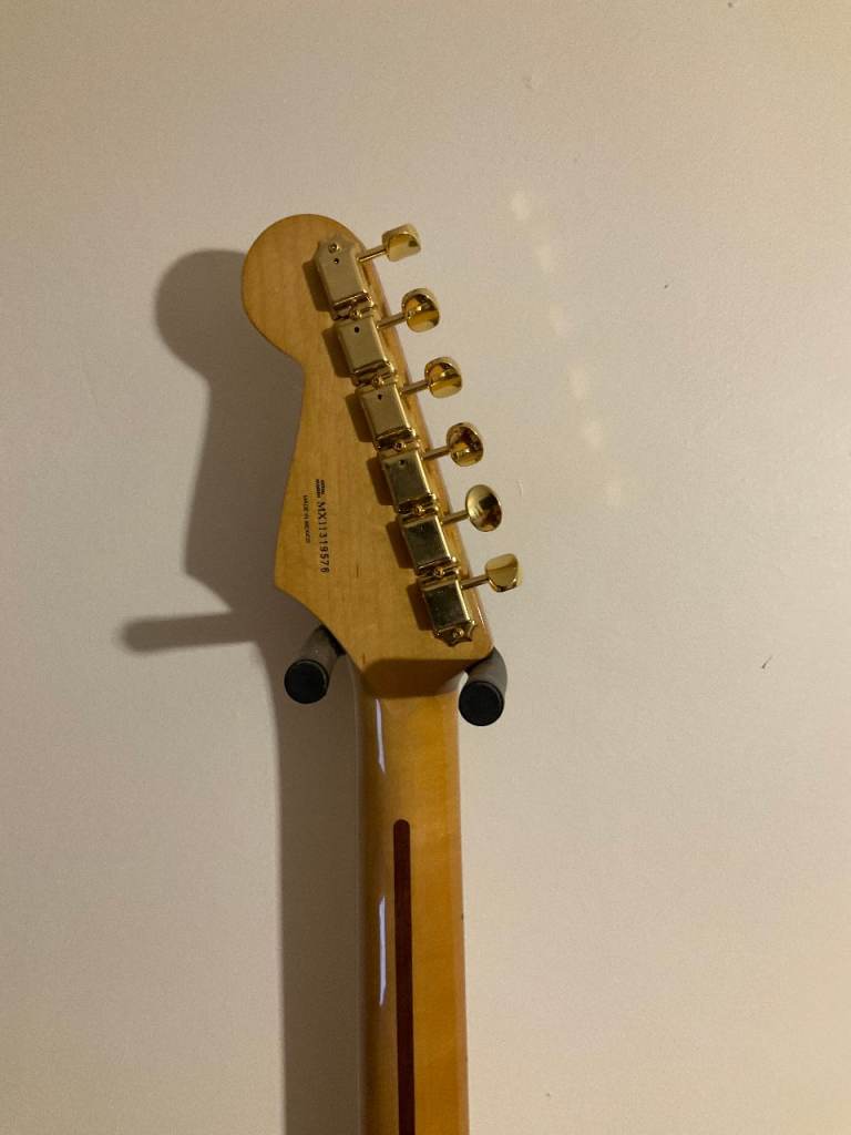 Fender Stratocaster with upgraded Fender gold hardware   