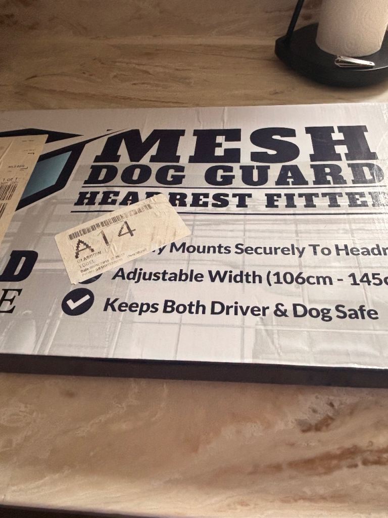 Mesh dog guard for car 