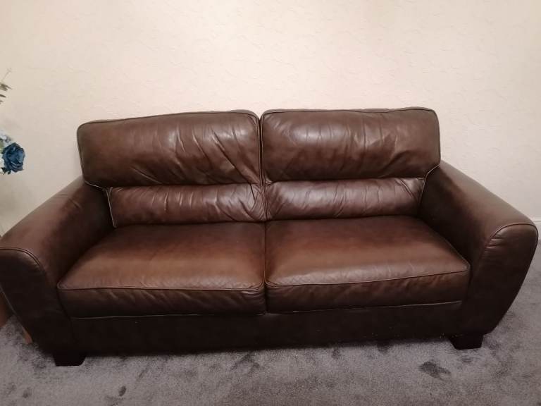 Leather sofa and foot stool