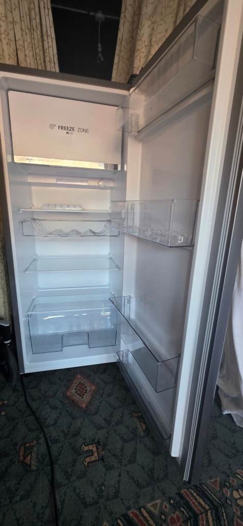 Like new fridge with small freezer,spotlessly clean. 