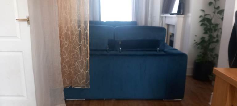 Deep blue velvet corner sofa