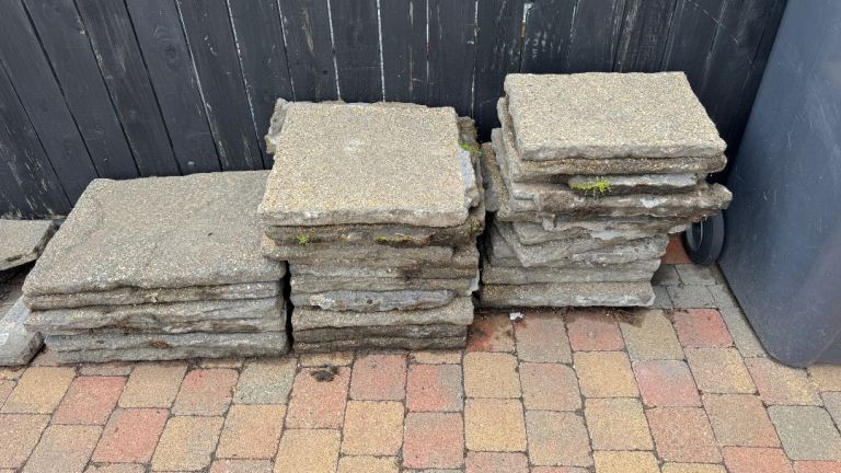 Selection outdoor used paving stones pavers concrete slabs 