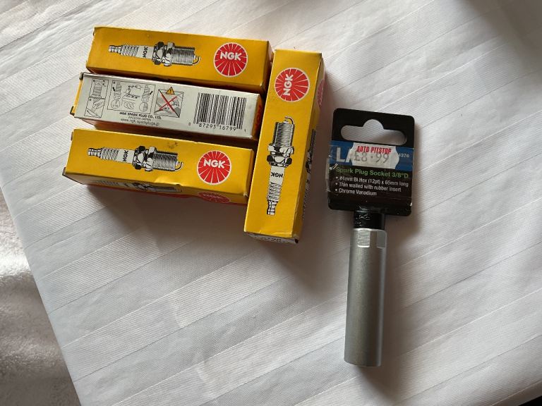 Spark plugs x 4 plus long reach socket  cost £26.98