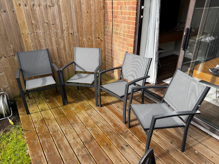 Set of 4 Grey Metal Garden Patio Chairs. Brand new 