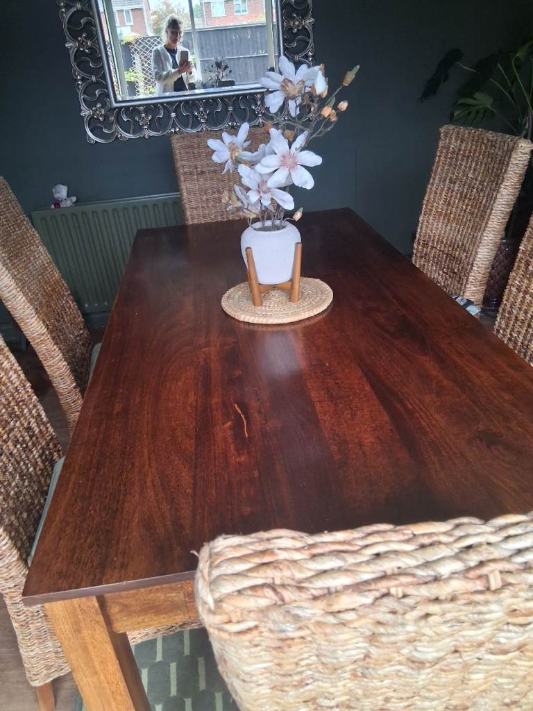 Solid Wood Dining Table with 6 Wicker Chairs – Good Condition