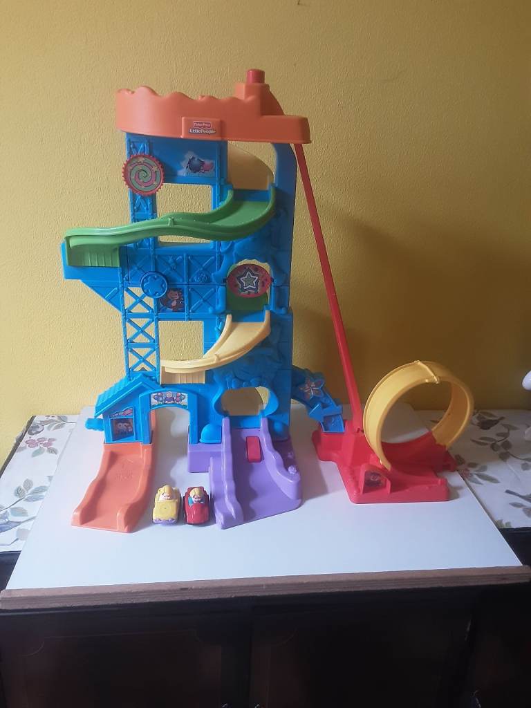 Fisher price  ,little people,  Race down  circus  track .with cars .