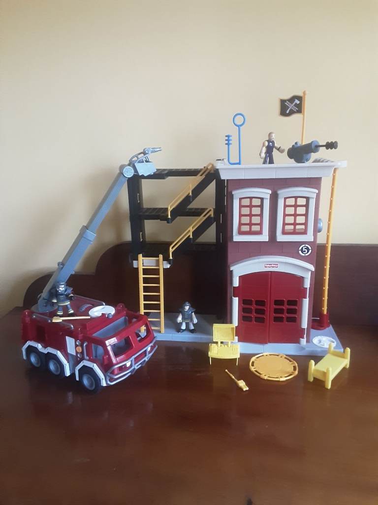 Fisher price lmaginex  large  fire station. Fire engine  lights and sounds. 