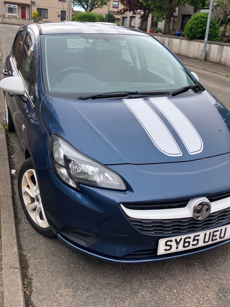 Vauxhall Corsa blue with 2 white stripes