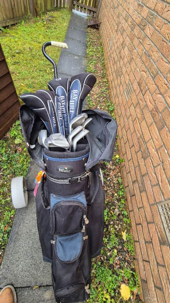 Golf clubs, bag and trolley 