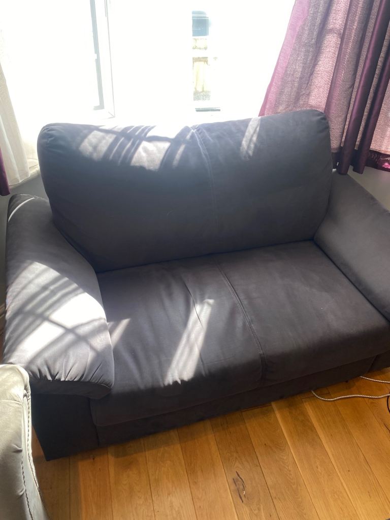 Comfortable Grey Two-Seater Sofa – Good Condition