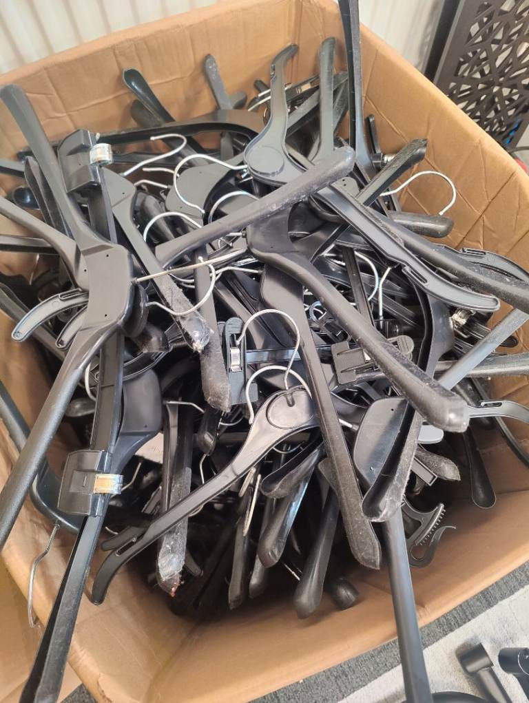 image for 2 box full of hangers .
