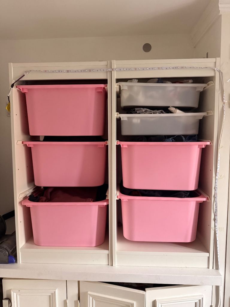 IKEA storage unit with boxes 
