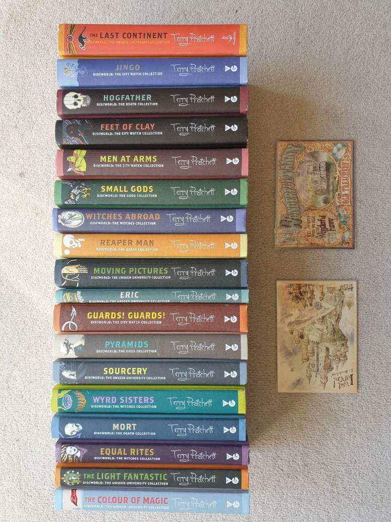 Unread Terry Pratchett Discworld Collector's Library Editions (18 books) plus postcards