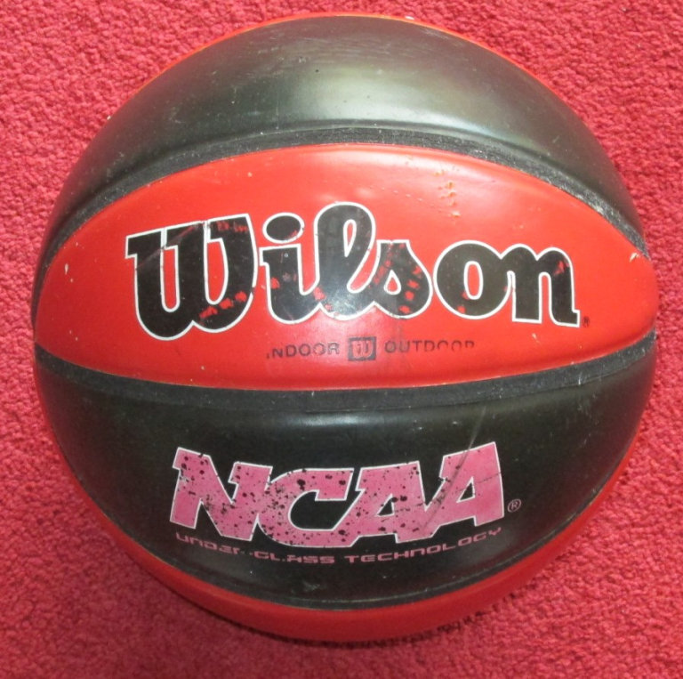 WILSON BASKET BALL RED AND BLACK  NCAA UNDER CLASS TECHNOLOGY 
