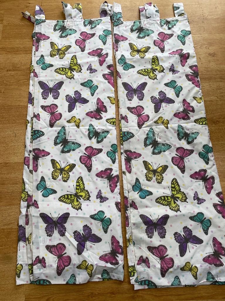 Curtains with tabs and blackout lining