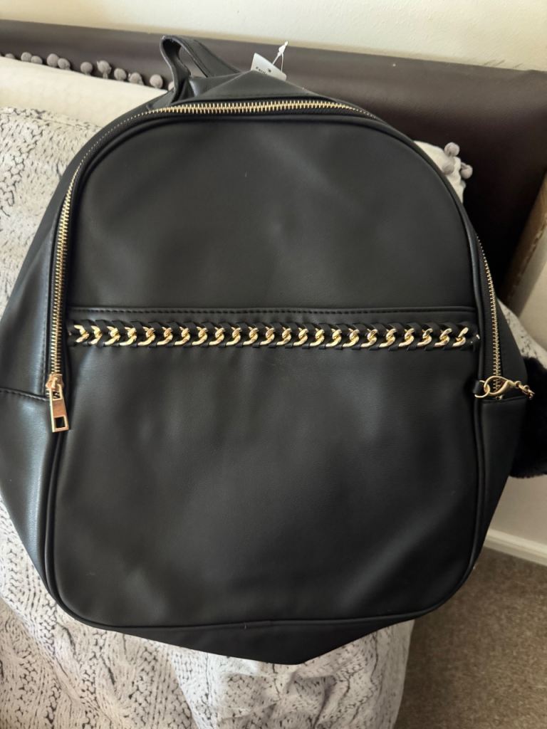 Stylish Black Backpack with Gold Chain Detail – Brand New