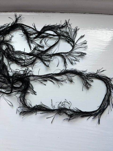 Generous  10 metres  delicate black fringe