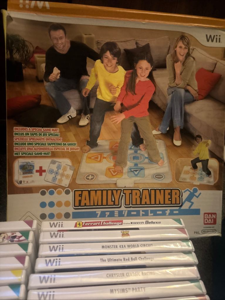 Nintendo Wii Console & Family Trainer with 30+ Games & Accessories