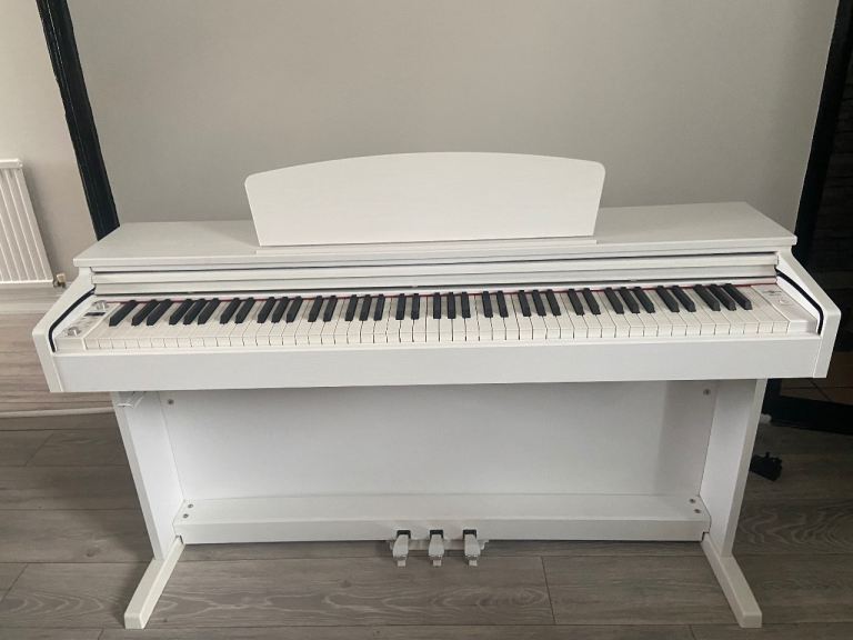 White Digital Piano with Bench – Good Condition
