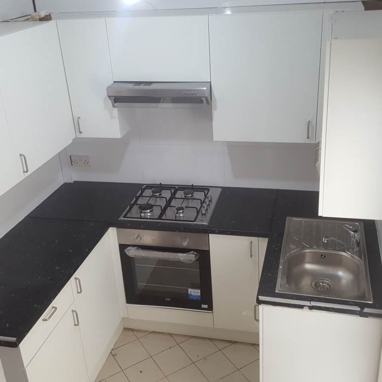 A two bedroom end terrace house to let in South London, Tooting