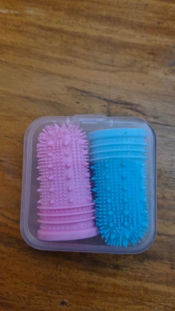 silicone finger toothbrushes for dogs and cats. cleaning pets' teeth and gums. 