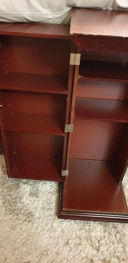 Roman plinth cabinet unit on wheels opens with shelving inside  drinks storage cupbard 