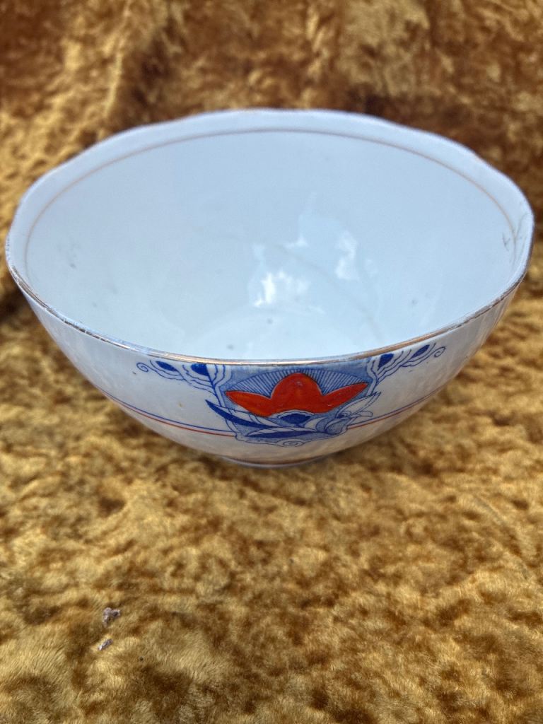Decorative Ceramic Bowl – White with Red and Blue Pattern