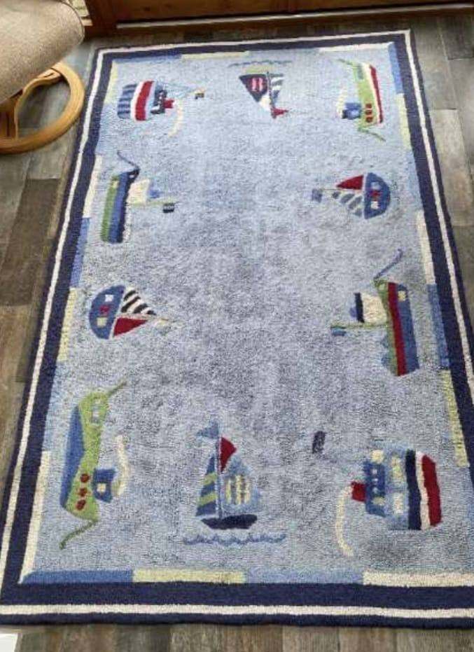 As new rug with boats on