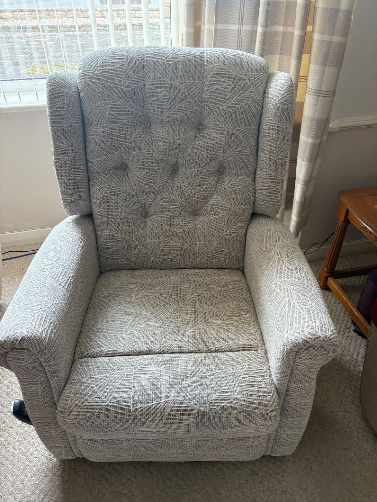 Care Co Comfortable Grey Fabric Rise and Recliner Armchair