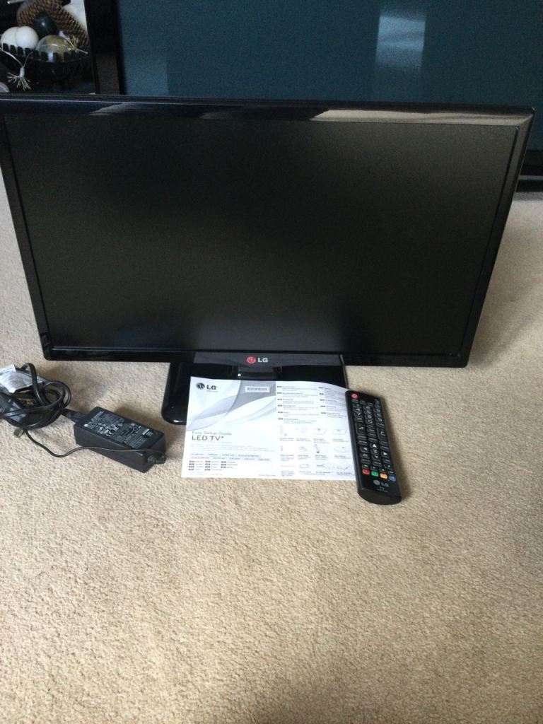 LG TV 22 inch with remote and quick setup guide
