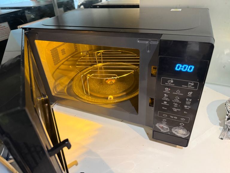 Sharp Digital Microwave Oven – Compact Black – Multiple Auto Programs – Excellent Condition