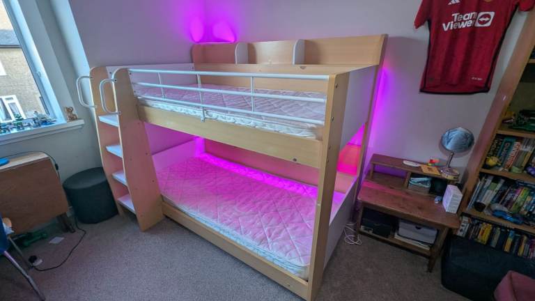 Solid kids bunk beds with built-in shelving (mattresses inc). Now $140. 