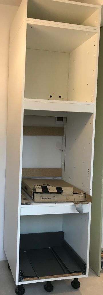 Howdens tall kitchen oven housing and shelving units