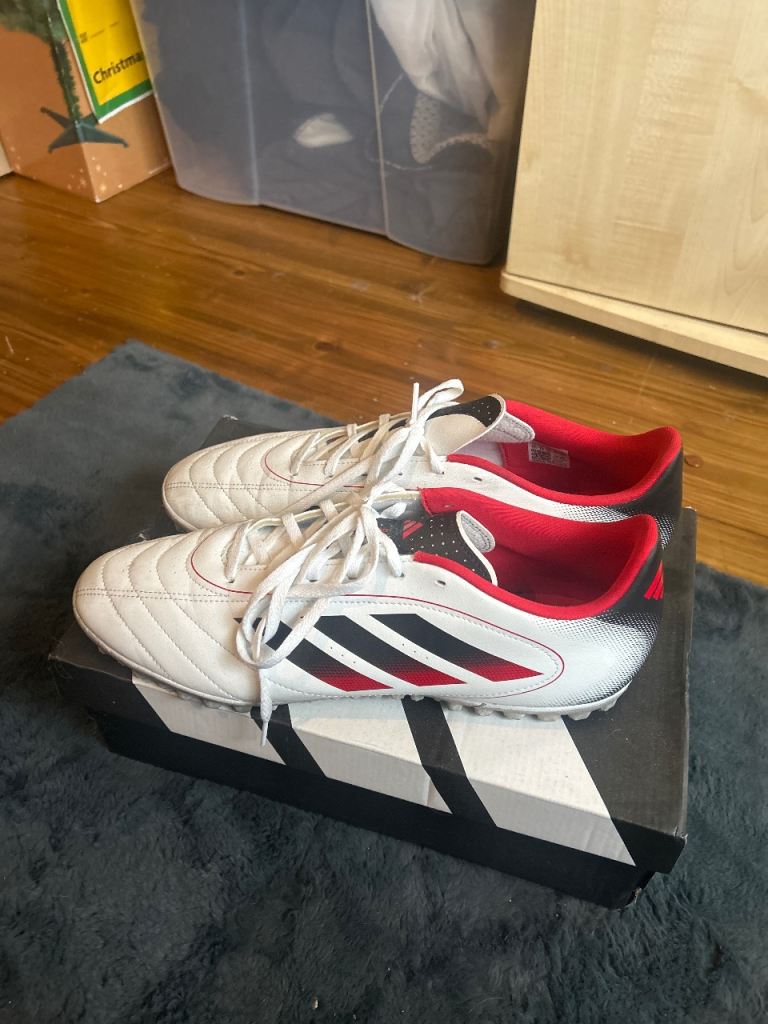 Red/white/black adidas Astro-turf boots 