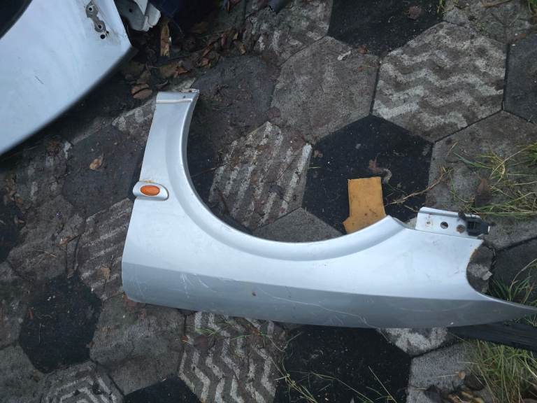 Chrysler grand voyager ns left wing as pictured