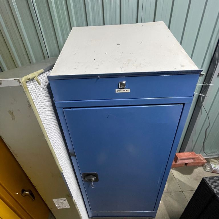 Tool cabinet with drawer pull out trays on wheels. 