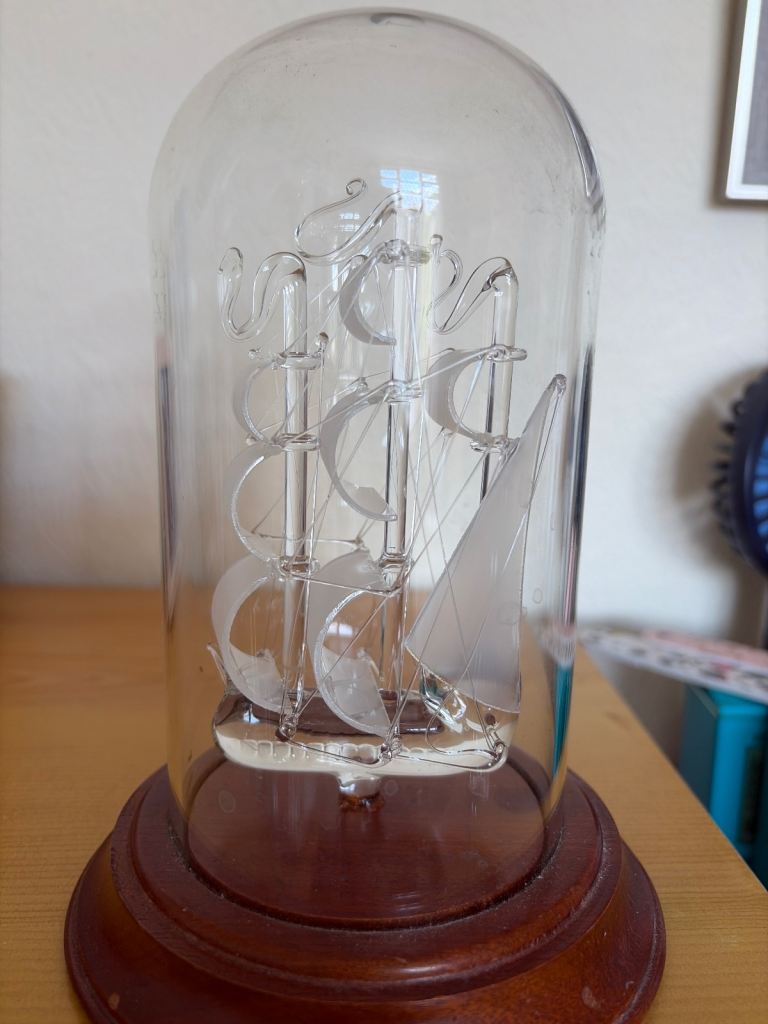 Glass tall ship in bottle