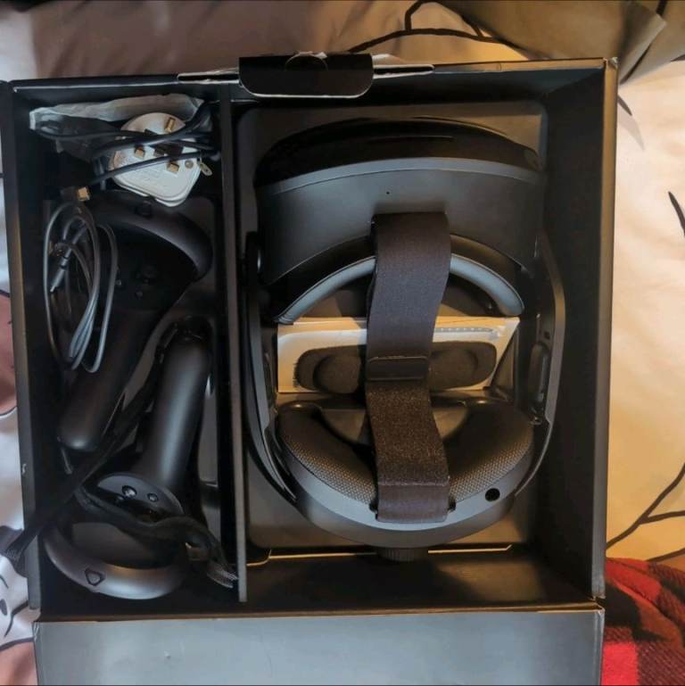 Vive Focus 3 VR headset with charging dock and extra battery