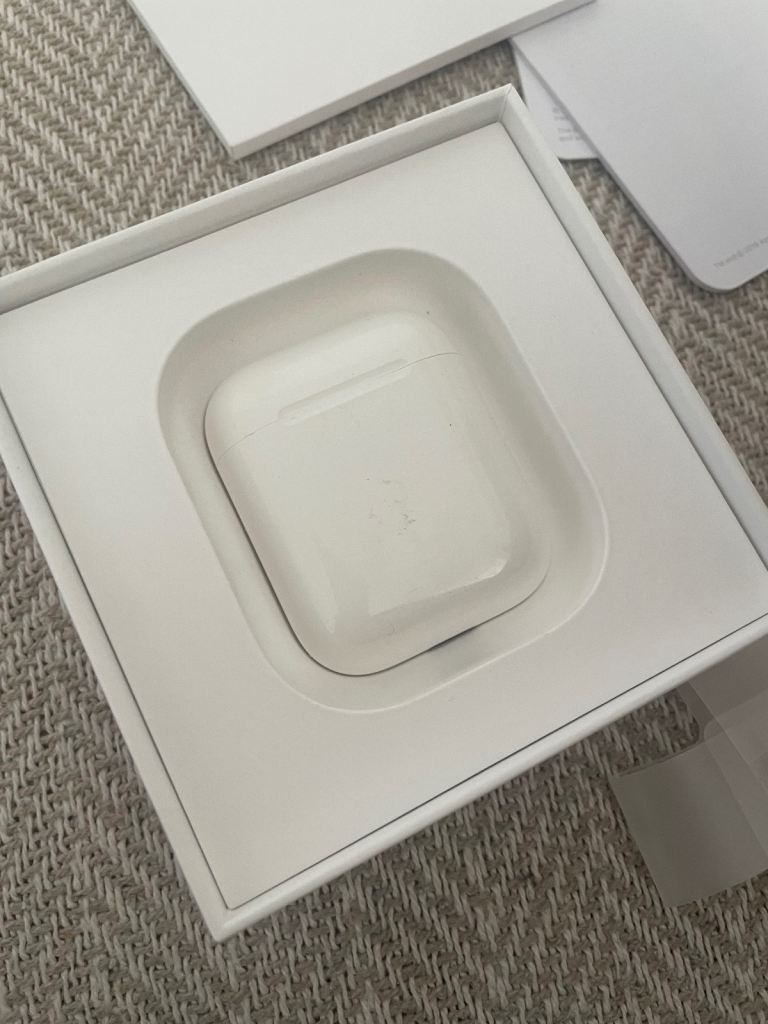 Apple AirPods with charging case and original box